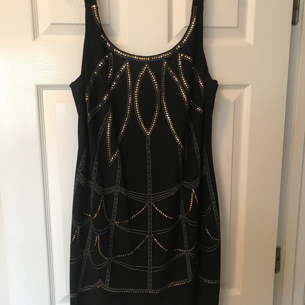 Black dress with gold and silver embellishments